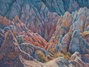 Pinnacles at Badlands Painting by Brenda Howell showing colorful rocky erosion landscape with desert shrubs at Badlands National Park in South Dakota.